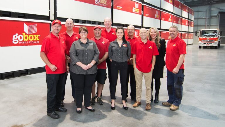 goBox mobile storage team standing together in company uniforms.
