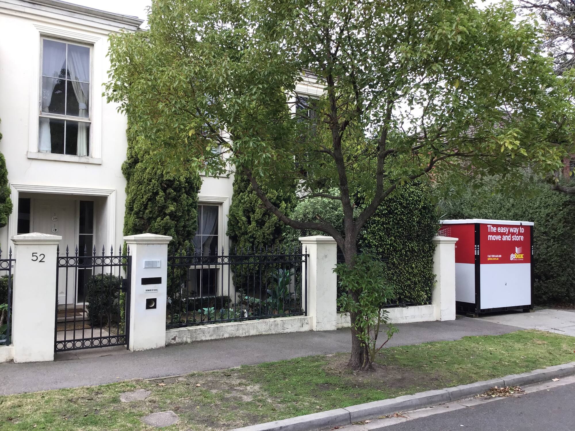 gobox unit outside a city townhouse, ready for decluttering