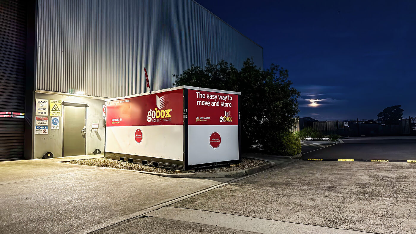 gobox storage unit outside the gobox warehouse at night